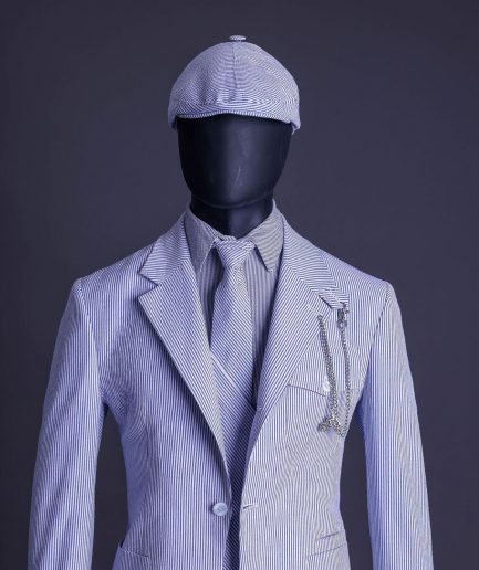 A monochrome seersucker (rail road stripe) notch lapel suit