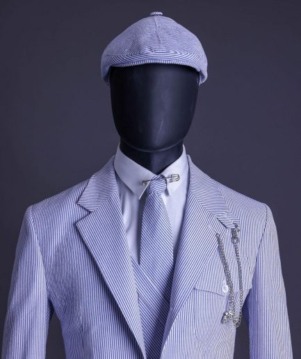 A monochrome seersucker (rail road stripe) notch lapel suit