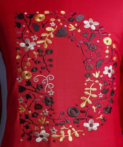 A Crimson red, U-shaped neck, letters floral, 3/4 sleeve embroidery detail African senator Kaftan.