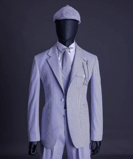 A monochrome seersucker (rail road stripe) notch lapel suit