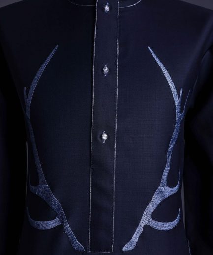 A charcoal black front flap, deer horn embroidery, clear view Swarovski buttons, 3/4 sleeve details, African senator Kaftan native.