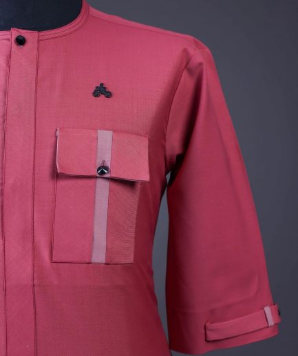 A Rogue pink, Front flap with black Swarovski button, 3/4 sleeve with combat patch pocket details African senator kaftan native.