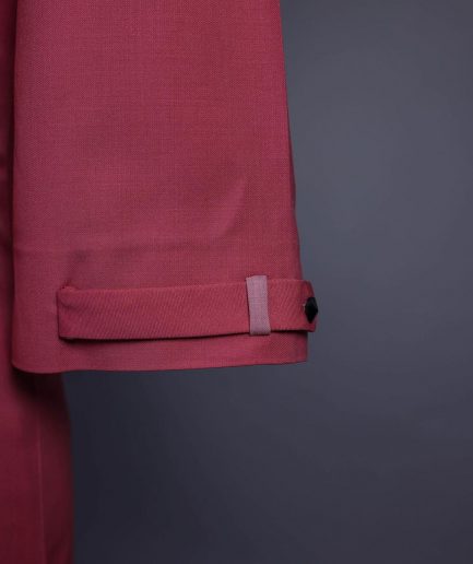 A Rogue pink, Front flap with black Swarovski button, 3/4 sleeve with combat patch pocket details African senator kaftan native.