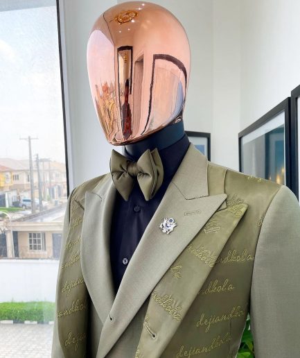 A “scritto” (inscribe your name) dark olive green, layered 4 lapel suit