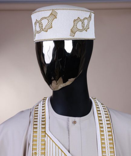 A porcelain, connected medulla and wooven pattern embroidery detailing agbada