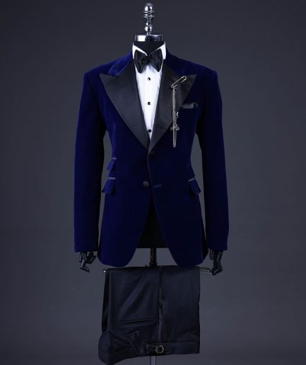 A Navy blue, soaked velvet peak lapel tuxedo suit