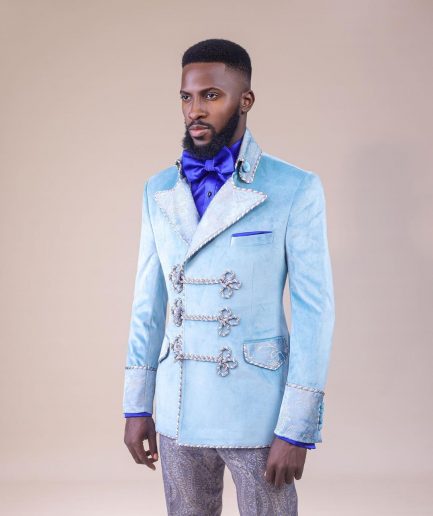 A “Milano” Skye blue, double breasted with matching gold floral detailing, hand knitted buttons