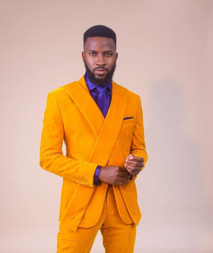 A Mustard yellow “X” one button Notch lapel suit