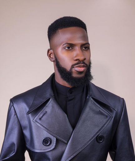 An oversized “Ghost Rider” leather, Charcoal black, double breasted trench bikers jacket