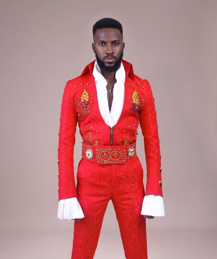 A “Presley (16 - 08 - 1977) ” red Jacquard with metallic wire and Swarovski buttons embroidery costume top