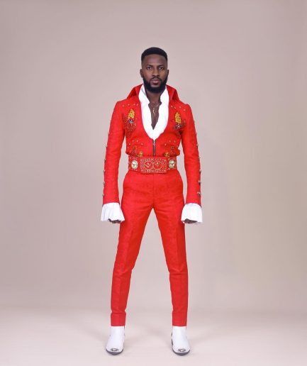 A “Presley (16 - 08 - 1977) ” red Jacquard with metallic wire and Swarovski buttons embroidery costume top