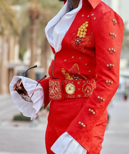 A “Presley (16 - 08 - 1977) ” red Jacquard with metallic wire and Swarovski buttons embroidery costume top
