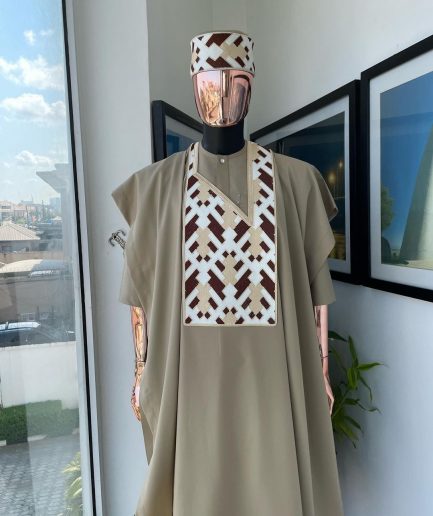 A Tortilla brown, layered tettri pattern embroidery detailing agbada