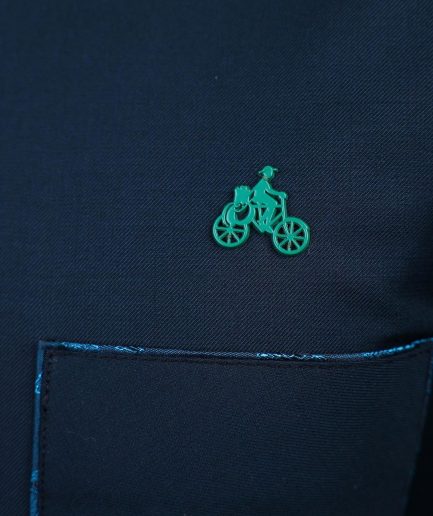 A Sacramento green, Front flap with green Swarovski buttons, patch pocket, 3/4 sleeve details African senator kaftan native.