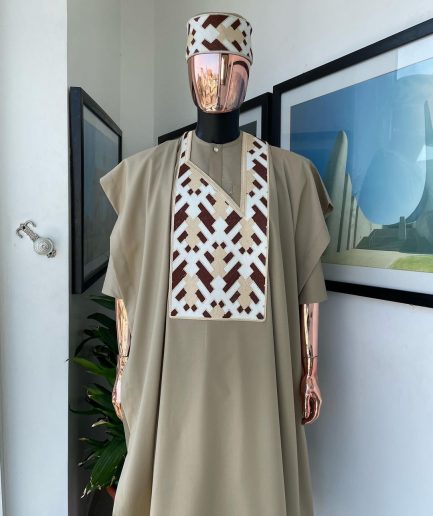 A Tortilla brown, layered tettri pattern embroidery detailing agbada