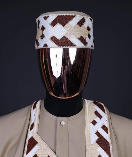 A Tortilla brown, layered tettri pattern embroidery detailing agbada