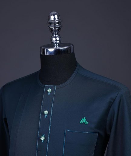 A Sacramento green, Front flap with green Swarovski buttons, patch pocket, 3/4 sleeve details African senator kaftan native.