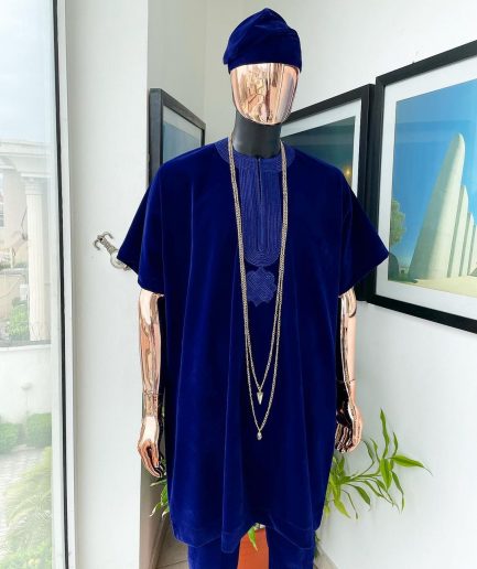 An Admiral blue daftan, sokoto & Fila Yoruba African native.