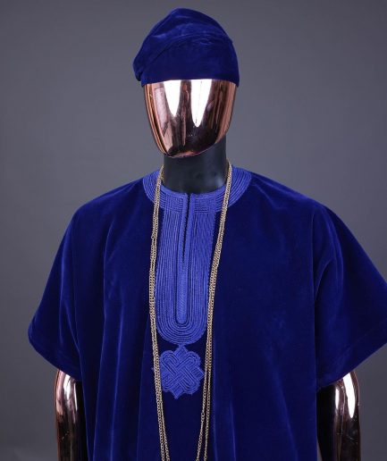 An Admiral blue daftan, sokoto & Fila Yoruba African native.