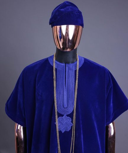 An Admiral blue daftan, sokoto & Fila Yoruba African native.