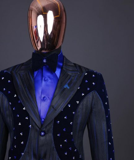 A “Prodigal” lashed midnight blue, admiral blue and splashed black metallic jacquard trench suit