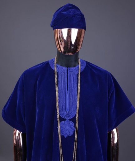 An Admiral blue daftan, sokoto & Fila Yoruba African native.