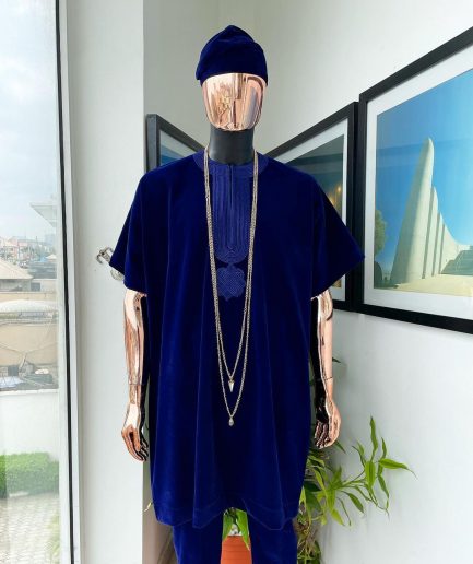 An Admiral blue daftan, sokoto & Fila Yoruba African native.