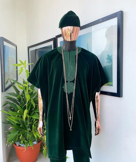 A Sacramento green daftan, sokoto & Fila Yoruba African native.