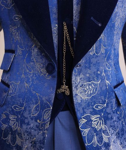A peak lapel dispersed Sky blue and splashed champagne gold metallic jacquard tuxedo suit