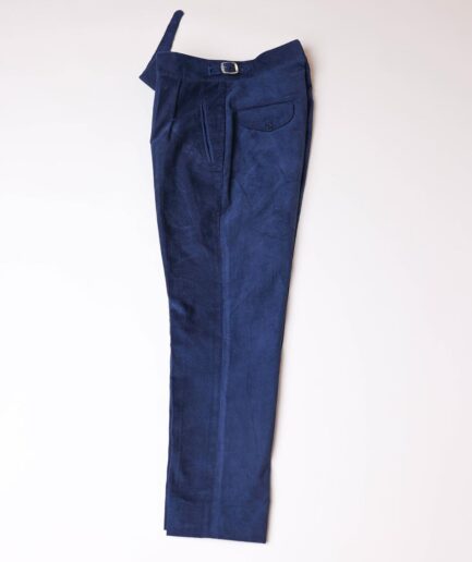 Gurkha trousers with pleats, double side strap buckles, slanted front welt pockets, and a back patch pocket.