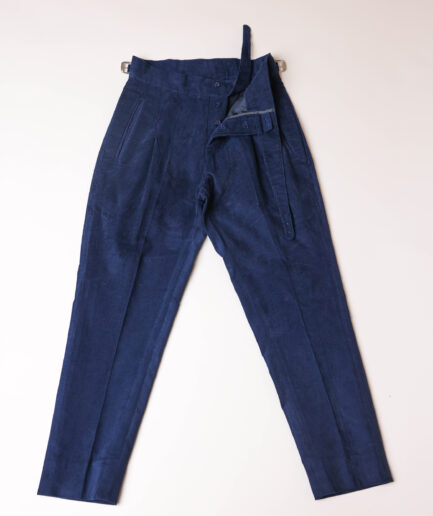 Gurkha trousers with pleats, double side strap buckles, slanted front welt pockets, and a back patch pocket.