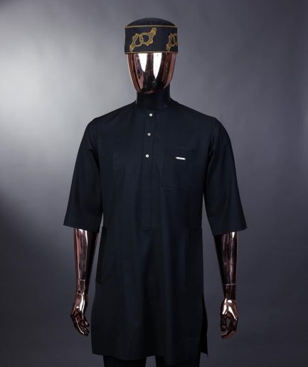 A charcoal black front flap with gold Swarovski buttons, patch pocket, and 3/4 sleeve details African senator kaftan native