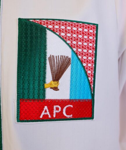 A white, APC ( All Progressive Congress) pattern embroidery, 3/4 sleeve African senator kaftan native.