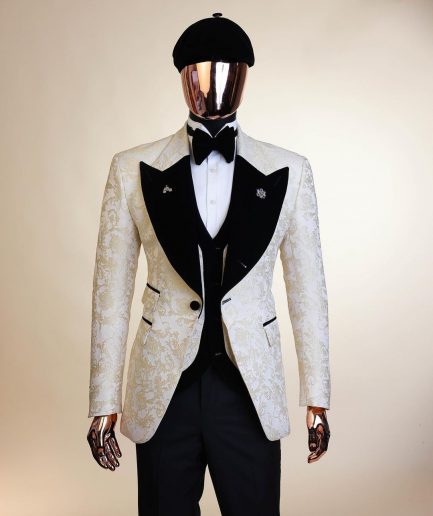 An Ivory white and Gold Floral patterned Peak lapel metallic jacquard tuxedo suit.