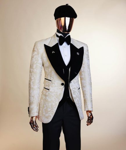 An Ivory white and Gold Floral patterned Peak lapel metallic jacquard tuxedo suit.