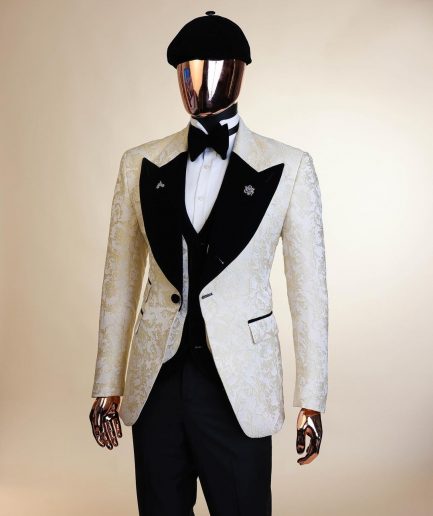An Ivory white and Gold Floral patterned Peak lapel metallic jacquard tuxedo suit.