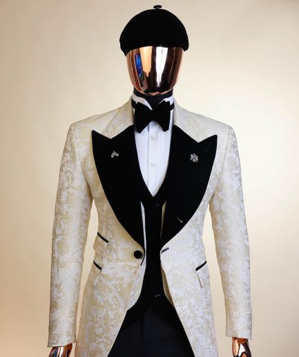 An Ivory white and Gold Floral patterned Peak lapel metallic jacquard tuxedo suit.