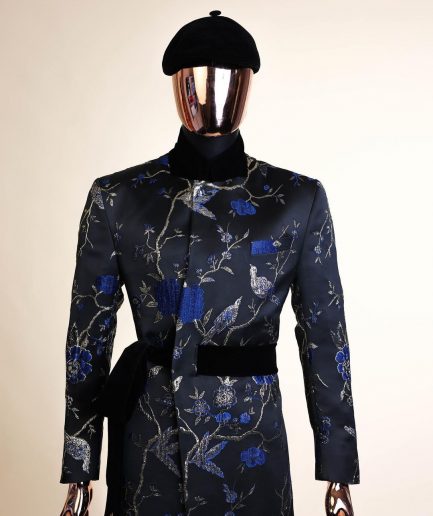 A Gold, black and blue double breasted safari suit, raven and forest metallic pattern jacquard