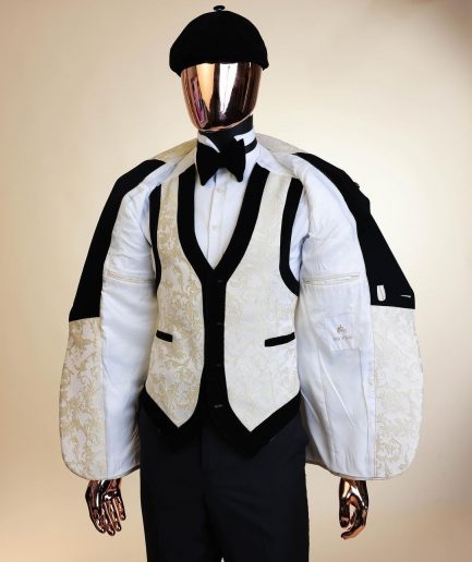 An Ivory white and Gold Floral patterned Peak lapel metallic jacquard tuxedo suit.