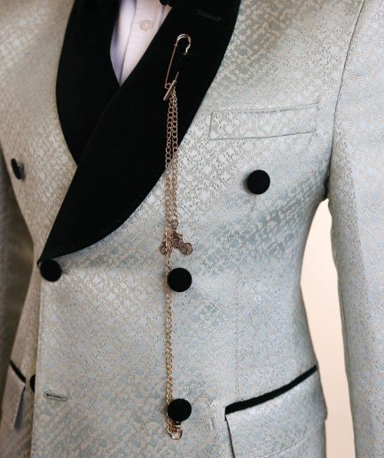 A shawl lapel, Double breathed, pick stitched splashed navy mint green, cream metallic jacquard tuxedo suit