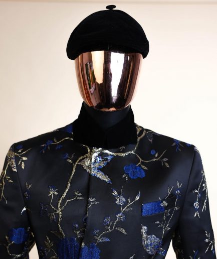 A Gold, black and blue double breasted safari suit, raven and forest metallic pattern jacquard