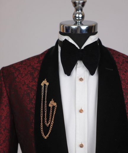 A splash of burgundy and black shawl lapel (black velvet) tuxedo suit