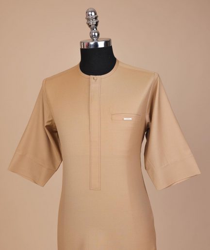 A Tortilla brown, front flap with Swarovski button, 3/4 sleeve African senator kaftan native.