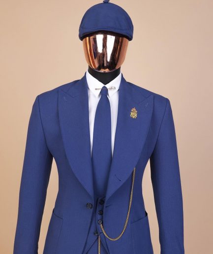 A “peaky blinders” navy blue seersucker fabric knitted peak lapel suit
