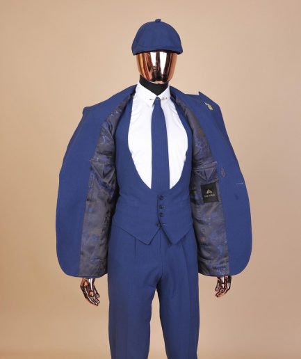 A “peaky blinders” navy blue seersucker fabric knitted peak lapel suit
