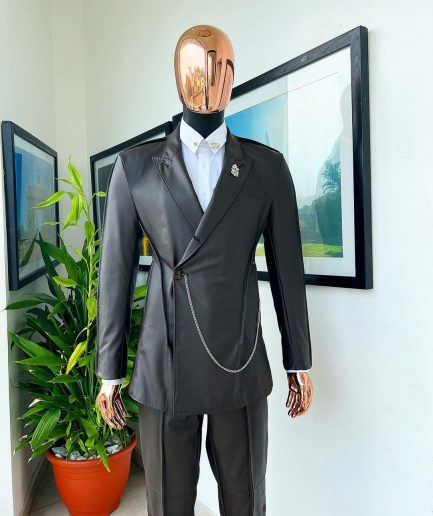 A #Herd” brown leather, knitted & outer layered peak lapel wrap suit