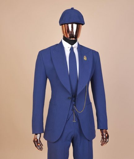 A “peaky blinders” navy blue seersucker fabric knitted peak lapel suit