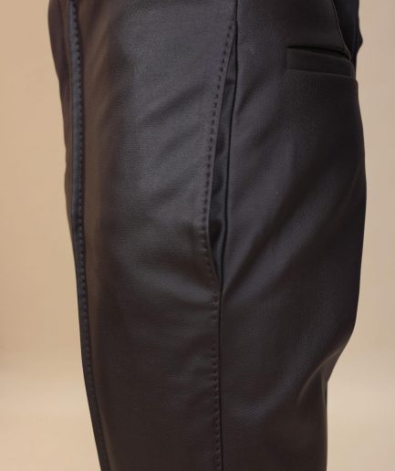 A brown leather, knitted & outer layered pant Trouser with side opening.