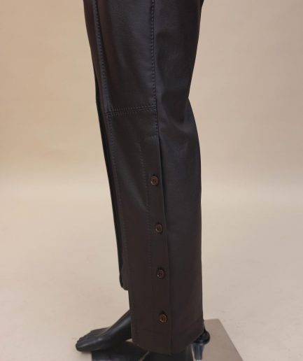 A brown leather, knitted & outer layered pant Trouser with side opening.