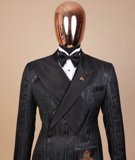 The “Da Vinci” charcoal black, metallic jacquard, single lapel, mid cut intersect strap tuxedo suit.